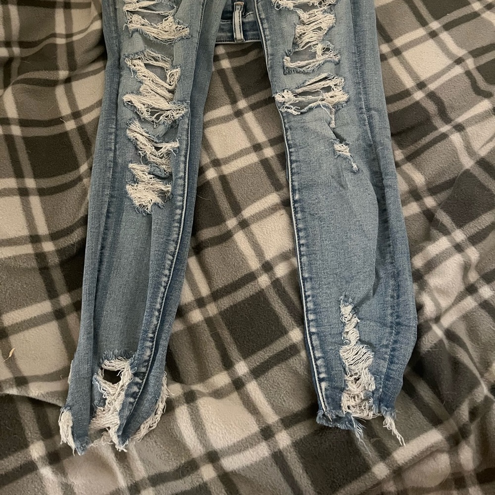 AE ripped “next level stretch” high rise jeans. Size 6 reg